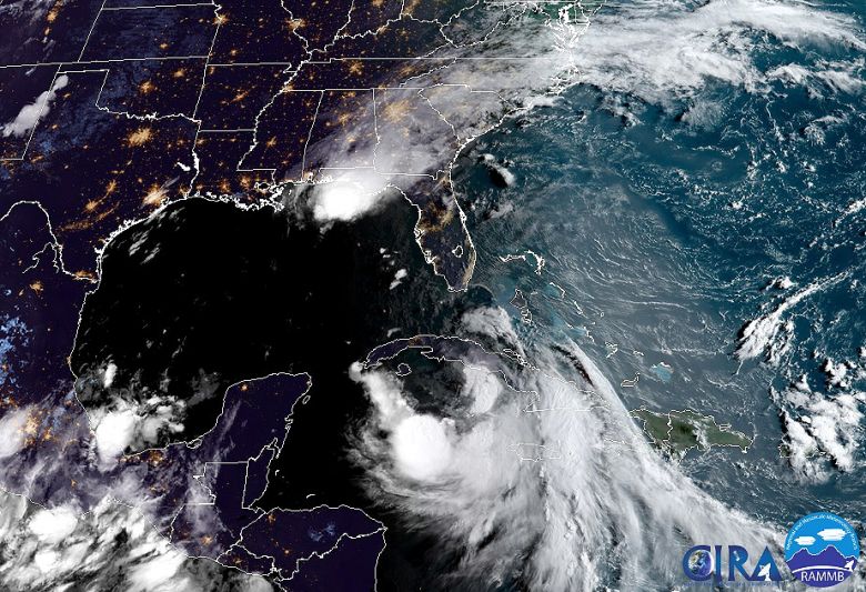 Imagem de satlite do dia 24 de agosto mostra a tempestade tropical Marco prxima  costa da Louisiana, no sul dos Estados Unidos e a tempestade tropical Laura na regio de Cuba, no Caribe. Crdito: NOAA/GOES